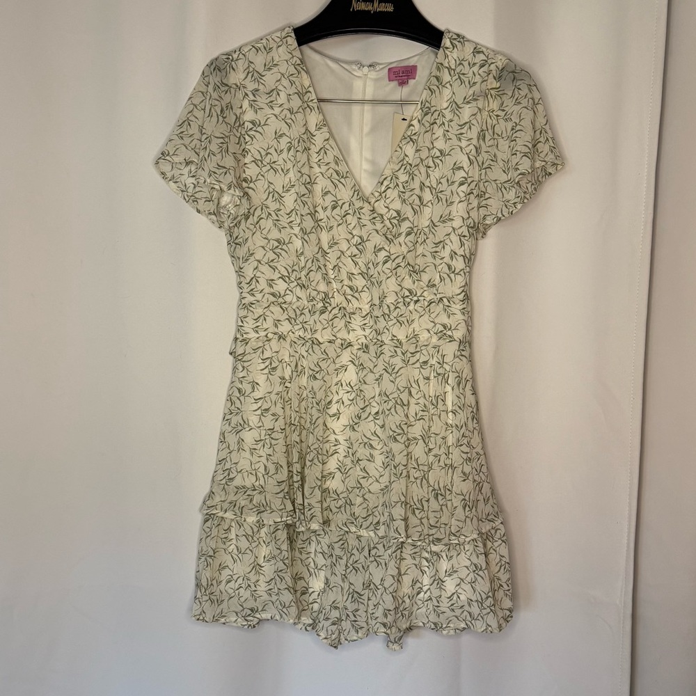 Miami Leaf Patterned Romper in Cream and Green from Francesca’s